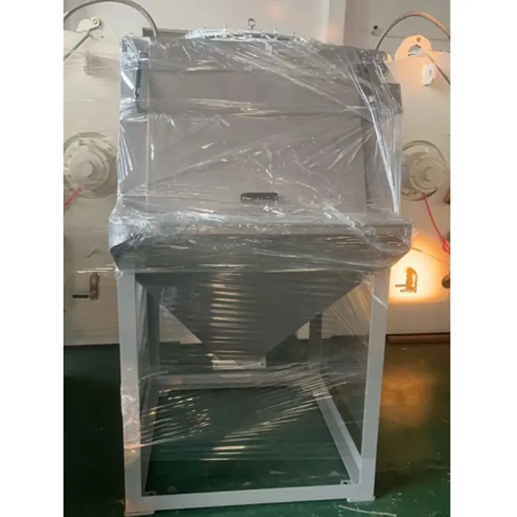 Station de déversement de matières auxiliaires en poudre